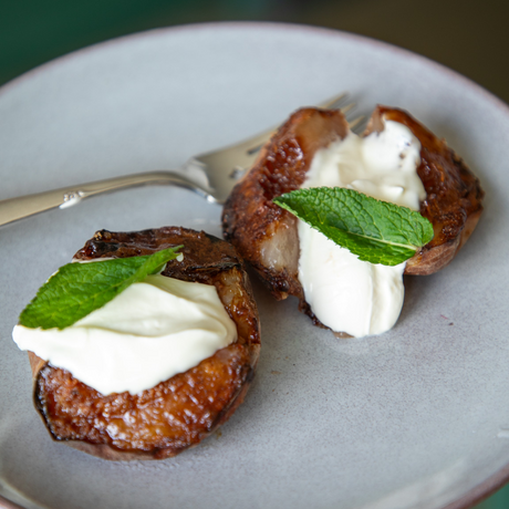 Air Fryer Baked Peaches with Crème Fraiche and Mint